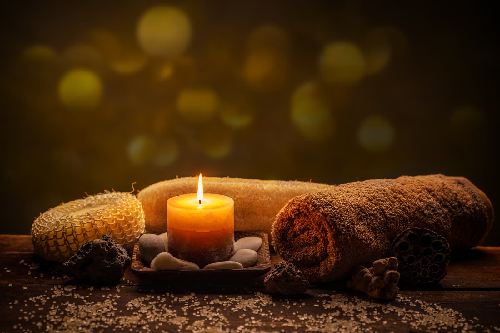 A calm massage therapy setting with soft, natural light